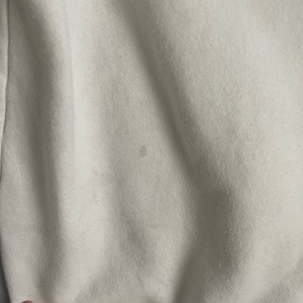 White and black under armor sweatshirt